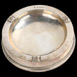 A George V silver-mounted ashtray, with rope twist and raised acanthus leaf bosses, by Albert Edward