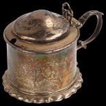 A Victorian silver lidded tankard mustard pot, engraved foliate and flaming torch decoration, with