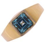 A heavy modern 18ct gold blue topaz signet ring, unsigned, setting height 10mm, size S, 18.3g No