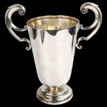 A large George V Art Deco silver 2-handled pedestal trophy cup, plain tapered cylindrical form