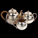 A Japanese Export silver 'bamboo' 3-piece tea set, circa 1910, relief embossed decoration with wicke