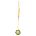An Edwardian 15ct gold peridot and pearl drop pendant necklace, set with round-cut peridot,