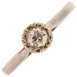 A mid-20th century 0.25ct solitaire diamond ring, unmarked white metal settings with illusion