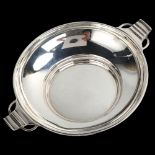 A George V Art Deco silver quaich bowl, D&J Wellby Ltd, London 1933, registration no. 783129, length
