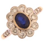 A modern 18ct gold sapphire and diamond oval cluster ring, set with oval mixed-cut sapphire and