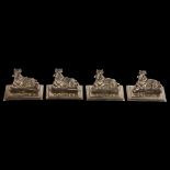 A cased set of 4 George V novelty silver Louis Wain cat menu card holders, by Levi & Salaman,