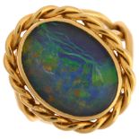 A late 20th century 18ct gold opal triplet ring, with rope twist surround and shank, maker's marks