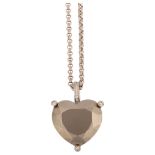 CHOPARD - an 18ct gold hematite and diamond heart pendant necklace, set with modern round