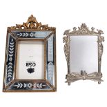 A cast silver plated Art Nouveau style strut frame, H22cm, and a decorative modern mirrored frame