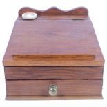 A small oak table-top writing slope with inkwell and drawer under, W27.5cm