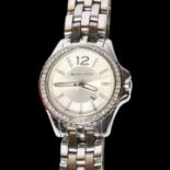 MICHAEL KORS - a lady's stainless steel wristwatch, with date aperture, with crystal set batons