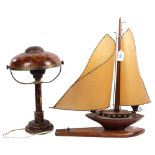 A wooden sailing ship design table lamp (1 sail split), H55cm, and a tortoiseshell effect Vintage