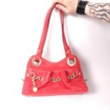 A Lancel Paris red leather handbag, L28cm A few minor surface scuffs