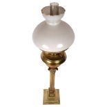 ELTEX - a brass Corinthian column table lamp with milk glass shade, H86cm All in good condition, a