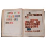 A partial album of UK and world stamps, including a One Penny Black, unperforated, no margins,