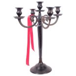 A heavy cast-metal 5-branch candelabrum with scrolled arms, H52cm