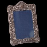 An Elizabeth II embossed silver-fronted folding frame, by Carr