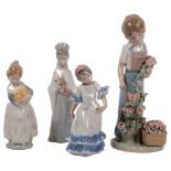 A group of Lladro porcelain figurines, including "King Balthasar", and "Roses For My Mum", etc (4)