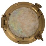 A German cast-bronze port hole, diameter 43cm Good overall condition, the port hole does open,