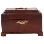 An Antique mahogany tea caddy with fitted interior and brass mounts, 23cm