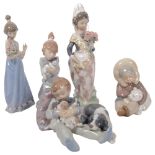 A group of Lladro figures, including boy with dog and puppies, girl in Spanish costume, H23.5cm, etc