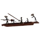 A group of Nigerian bronze fisherman figures and boat, L43cm