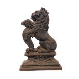 A cast-iron Heraldic rampant lion doorstop, H38cm