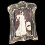 An Elizabeth II silver-fronted strut photo frame, in Art Nouveau style, by Carr's, hallmarks