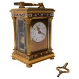 A French gilt-brass and champleve 8-day repeating carriage clock, white enamel floral decorated dial