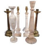 A pair of alabaster table lamps, H41cm, a pair of brass candlesticks, and 2 turned and painted