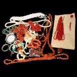 Various coral shell necklaces, carnelian panels, jadeite bangle, etc