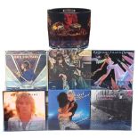 A group of vinyl albums, to include Rod Stewart Sing It Again Rod, Every Picture Tells A Story,