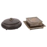 A Persian design metal box and cover, 12cm across, and a white metal floral decorated box on