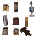 Various petrol and other lighters, including Elison Sports, Tommy, Polo, and a Northern Comfort