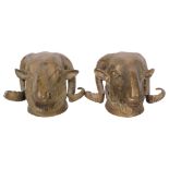 A pair of cast-bronze ram's head wall sconces, W18.5cm Both in good condition