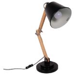 A contemporary Tomons wooden anglepoise lamp, with makers label and LED bulb