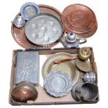 A pewter tea set, engraved copper trays, Cairo Ware plates, pewter-clad boxes etc