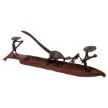 Circa 1920s, a Nigerian bronze fishing group depicting fishermen paddling while their comrade is