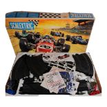 SCALEXTRIC - a boxed Grand Prix 75 set, appears complete and with original vehicles, associated