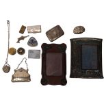 A collection of various boxes, including snuff, a silver plated purse, and a cloisonne heart-