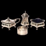 A George V silver 3-piece cruet set, with cast gadrooned edge on paw feet, with blue glass liners,