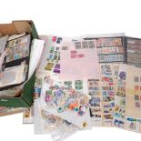 A large quantity of loose and leaf bound stamps, including Republic Of Haiti, Hong Kong, Tunisia etc