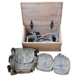 A Vintage pine box, a brass propeller, wooden spade, and a camouflage rucksack kit
