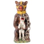 A large reproduction Staffordshire bear jug and lid, H30cm