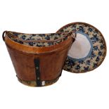 19th century metal-bound leather hat box and cover, with carrying handle, 34cm across