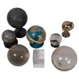 A collection of glass and other globes, including a barometer, and a lidded desk stand, H15.5cm