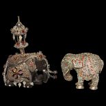 An ornate Indian ebony and caparisoned elephant, H9.5cm, and a similar elephant (2)