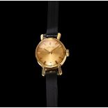 CORUM - a lady's 9ct gold cased mechanical wristwatch