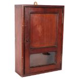 A mahogany letter box mail catcher cabinet with glazed panel, H42cm