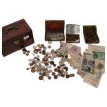 A box of various pre-decimal English coins, world banknotes and other coins